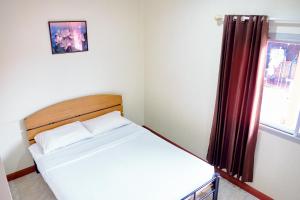 Postel nebo postele na pokoji v ubytování Toon Guesthouse