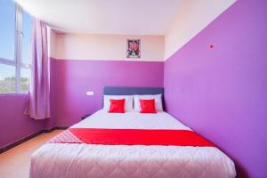Postel nebo postele na pokoji v ubytování CMN Hotel & Homestay