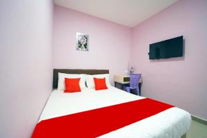 Postel nebo postele na pokoji v ubytování CMN Hotel & Homestay