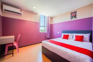 Postel nebo postele na pokoji v ubytování CMN Hotel & Homestay