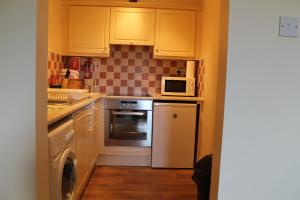 Una cocina o zona de cocina en Serviced Apartments Wexford