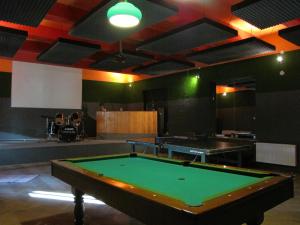 a room with a pool table in a room with a dj at Hostinec Stará Krčma in Stratená