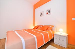 Postel nebo postele na pokoji v ubytování Apartments Nautilus