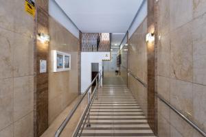 a hallway with stairs in a building at Apartment Fuengirola City Station in Fuengirola