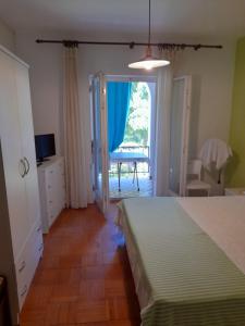 Postel nebo postele na pokoji v ubytování Apartments Fam Tomasic