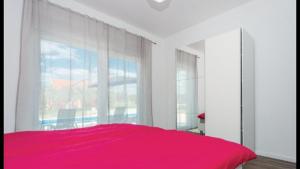 Posteľ alebo postele v izbe v ubytovaní Olive Tree House with Jacuzzi, WiFi and 40m2 pool