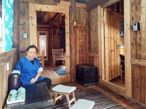 Posezení v ubytování Lost World Sanjiang Guest house