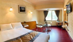 Posezení v ubytování Kao Feng Hotel