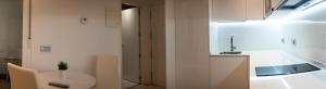 Kuchyňa alebo kuchynka v ubytovaní Apartamentos Palacio de Yolanda