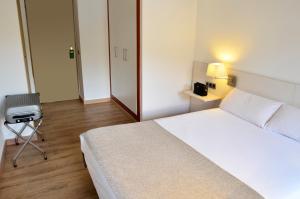 Voodi või voodid majutusasutuse Hotel Terranova toas