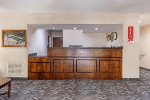 a court room with a large wooden desk at Econo Lodge in Saint Stephen