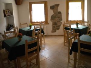 Restoranas ar kita vieta pavalgyti apgyvendinimo įstaigoje La Tieda - locazione turistica Reolon