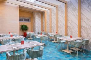 Reštaurácia alebo iné gastronomické zariadenie v ubytovaní Barceló La Nucía Palms