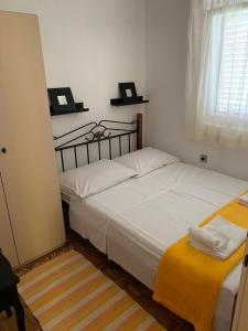 Posteľ alebo postele v izbe v ubytovaní Apartments Anka i Krešimir