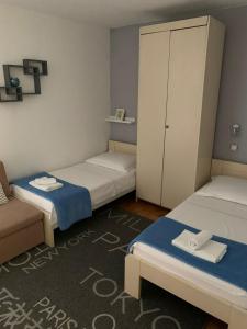 Posteľ alebo postele v izbe v ubytovaní Apartments Anka i Krešimir