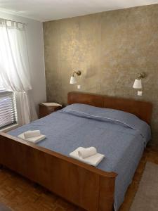 Posteľ alebo postele v izbe v ubytovaní Apartments Anka i Krešimir
