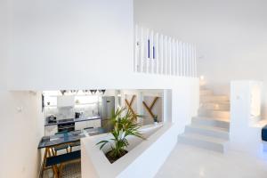 Ett kök eller pentry på Blue White Residence