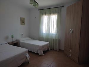 Posteľ alebo postele v izbe v ubytovaní Casas de Madera Los Molinos
