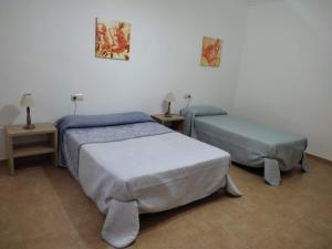 Posteľ alebo postele v izbe v ubytovaní Casas de Madera Los Molinos