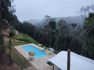 A view of the pool at Jângala Glamping Natureza or nearby