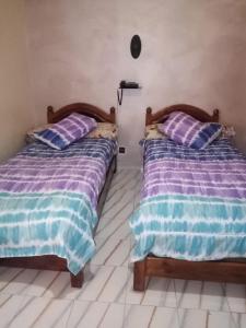 Postel nebo postele na pokoji v ubytování Hotel Aswan