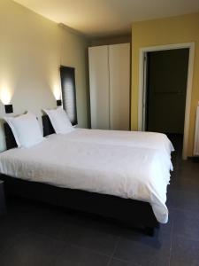 Ένα ή περισσότερα κρεβάτια σε δωμάτιο στο Touristflat Dewulf