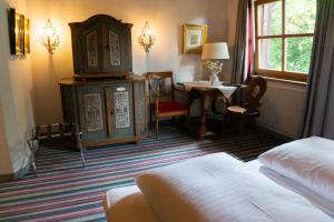 Postel nebo postele na pokoji v ubytování Hotel Schrenkhof