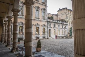 a view of a building with columns at Palazzo Graneri in Turin