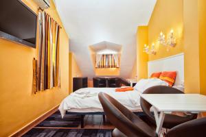 Postel nebo postele na pokoji v ubytování Boutique Hotel Pueblo