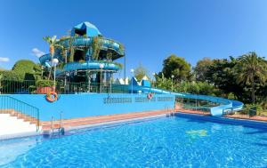 a water park with a water slide and a pool at Benal Beach Group in Benalmádena