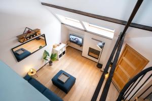 TV a/nebo společenská místnost v ubytování The Rose Suites