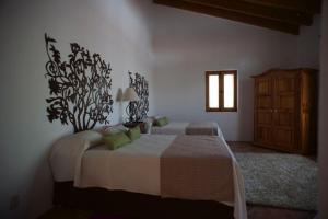 Voodi või voodid majutusasutuse La Casona de los Colibríes toas