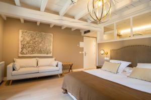 Posteľ alebo postele v izbe v ubytovaní Hotel Palacio De Luko