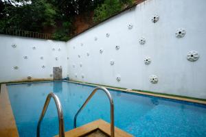 Piscina a De Lagom Comforts, Anjuna Beach o a prop