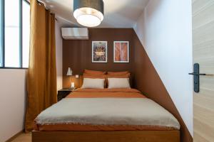 Postel nebo postele na pokoji v ubytování Apparts Seasons - Saint Étienne - La Terrasse