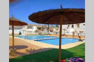 The swimming pool at or close to Casa Makis