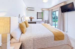 Cama ou camas em um quarto em Blue Horizon Hotel