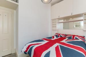 Säng eller sängar i ett rum på Radio Apartments London - Covent Garden