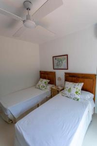 Posteľ alebo postele v izbe v ubytovaní Bonita stay B Light Piscina climatizada, bbq, wifi