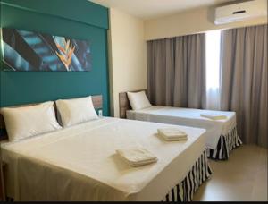 En eller flere senge i et værelse på Solar das Águas Park Resort - Olímpia