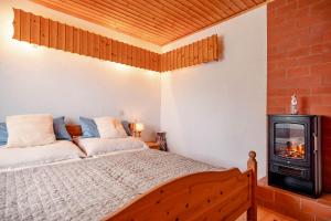 Postel nebo postele na pokoji v ubytování Ferienhaus Birker
