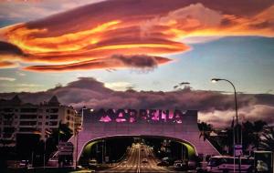 a painting of a bridge with a fire painting at Marbella Deluxe Rooms in Royal Cabopino Townhouse in Marbella