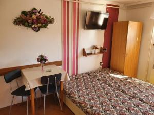 A bed or beds in a room at Privat u Jozefa Földesa