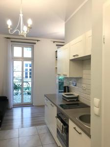 Kuchyňa alebo kuchynka v ubytovaní Apartament Matejki
