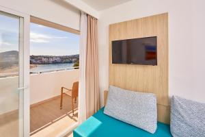 TV a/nebo společenská místnost v ubytování Apartamento de un Dormitorio Vista mar
