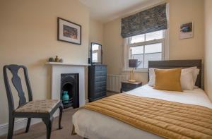 Postel nebo postele na pokoji v ubytování 109 Nunnery Lane - a House of York holiday home