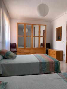 Llit o llits en una habitació de La Cabañita de Leiva