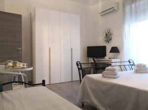 Posteľ alebo postele v izbe v ubytovaní Casa La Morettina - Cortile privato interno