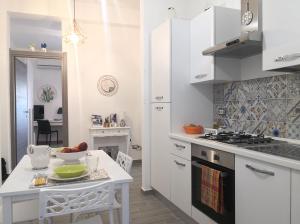 Kuchyňa alebo kuchynka v ubytovaní Casa La Morettina - Cortile privato interno