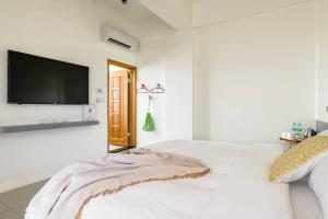 Postel nebo postele na pokoji v ubytování Mini House B&B